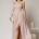 Rochie lungă de ocazie roz cu umăr gol și floare decorativă - Dy Fashion